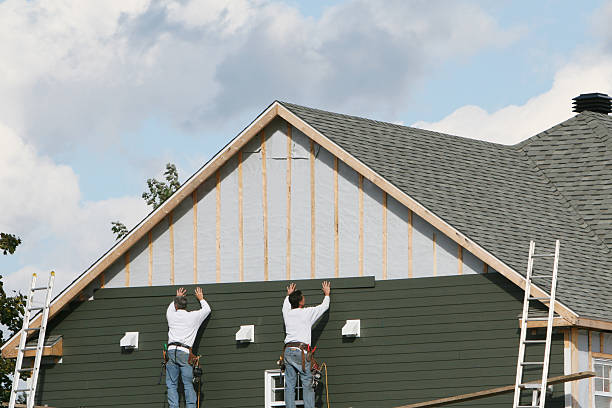 Professional Siding Contractor technician working in North Canton, OH